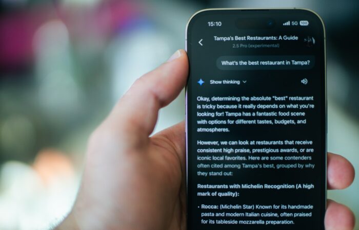 Someone is using their phone to find a restaurant.