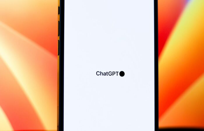 Close-up of a smartphone displaying ChatGPT with vibrant background. Ideal for tech and AI themes.