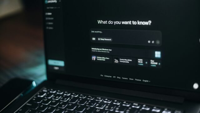 Laptop screen showing a search bar.